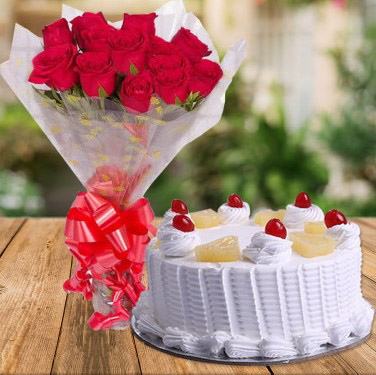 Bunch of Red Roses & Pineapple Cake midnight Delivery