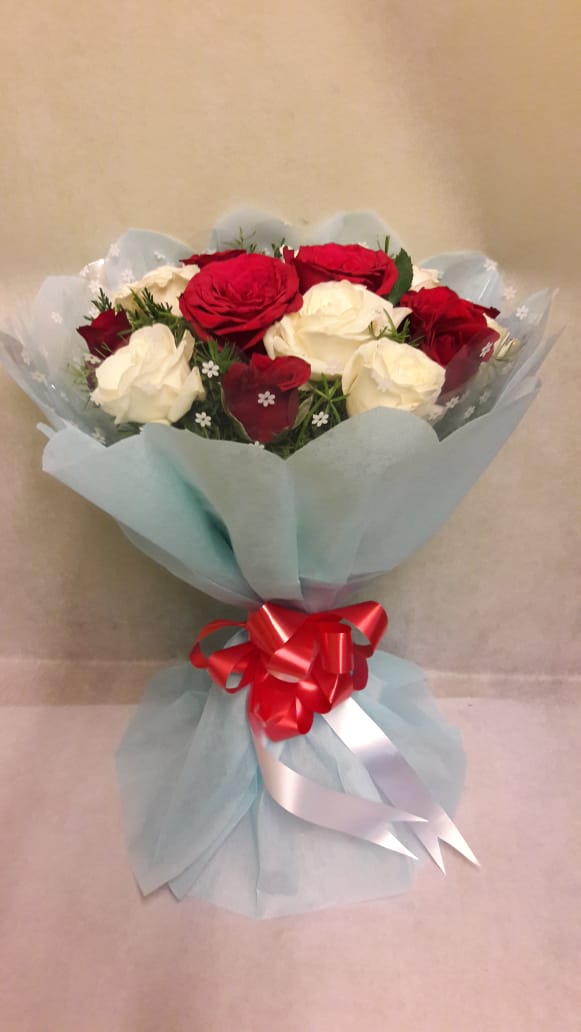 Red & White Roses in Blue Paper 