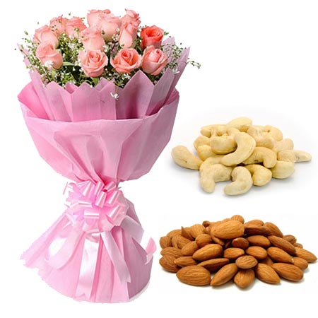 12 Pink Roses in Paper with 1/2kg Kaju & Almonds